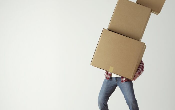 person with moving boxes